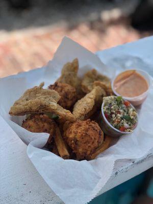 Cracked Conch , conch fritter , conch ceviche and fries.