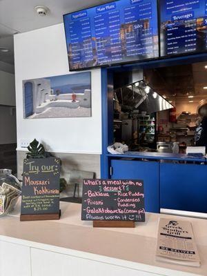 Indoor view of menu and kitchen