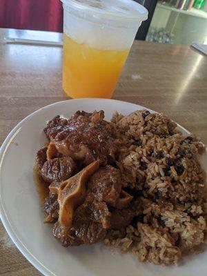 Oxtail, dirty rice, and fresh passion fruit juice