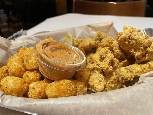 Catfish nuggets, taters, and sauce