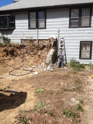 80 Fawell Natick in-law suite and renovations. Retaining wall for front yard removed.