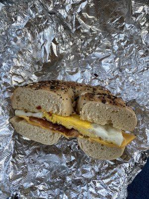 Bacon egg and cheese on whole wheat everything