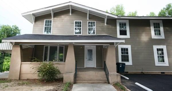 Home to two 2 BR apartments and two 1BR apartments this home is bursting with character and is located only one block to East!