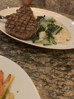 Ribeye with Bok Choy. Medium Rare. Great flavor.  Mashed potatoes were excellent.