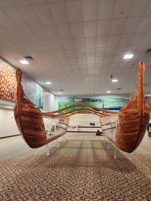 Water craft display in lobby between Ala Moana Hotel in Honalulu where we stayed after our cruise.