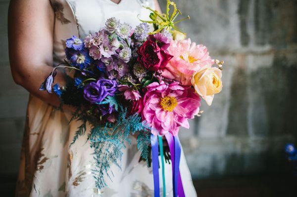 Colorful wedding bouquet at Olio modern industrial event space north of Boston Massachusetts, New England