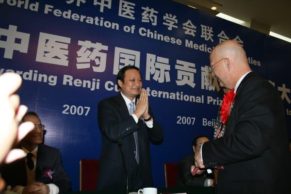 Receiving the Renji Cup at the People's Hall in Beijing from the Chinese Secretary of Health and Human Services.