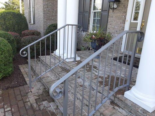 Custom built handrail with powder coat finish.