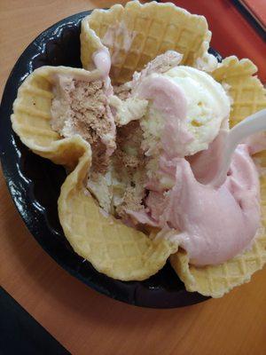 Raspberry sherbet, heath, almond joy, and coconut in a waffle bowl