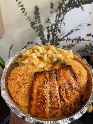 Salmon with rice and mac and cheese.