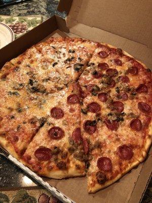 Mushroom, sausage, and pepperoni pizza