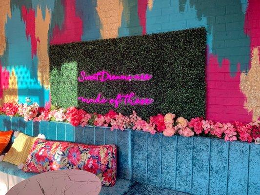 A cute, colorful area to sit and enjoy your sweets