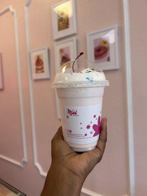 Cotton candy milkshake with sprinkles and cherry ( from build your own menu )