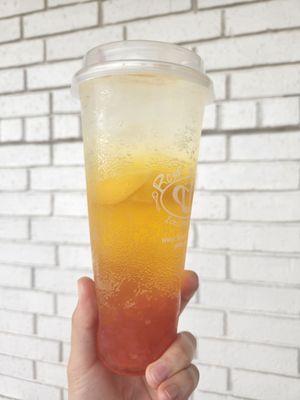 Peach sparkling water with popping boba