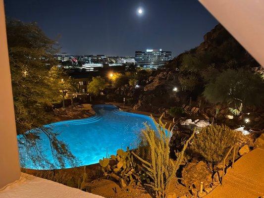 1 side of the pool view at night.