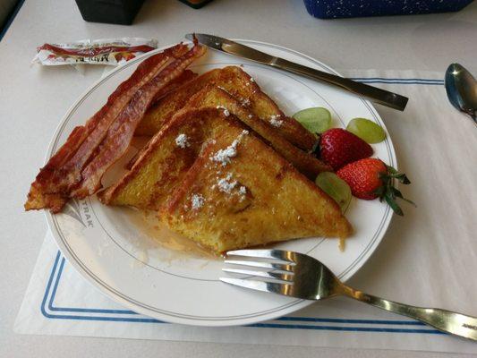 Breakfast was French toast and bacon.