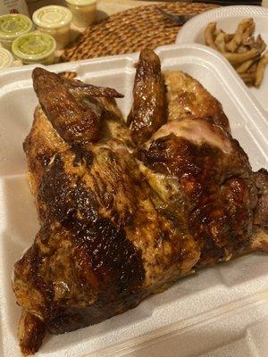 Fantastic flavorful Moist chicken. Spicy green sauce on the side is great also.  1 Pollo a la Brasa Combo  chicken combo $21