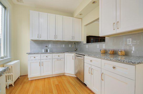 White cabinets remain as a fashion favorite in today's kitchens!