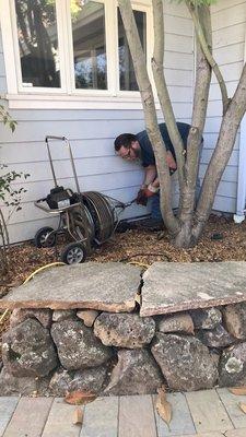 Lee snaking our clean out.