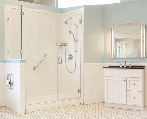 A frameless glass shower door maintains a clean, contemporary look for your bathroom.