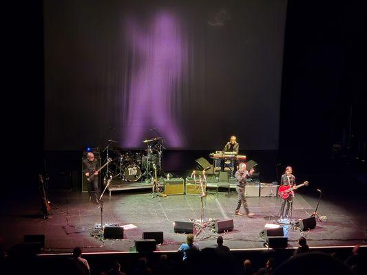 The band playing on stage