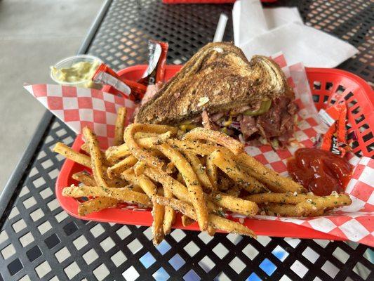 The hot Rueben with butter garlic fries