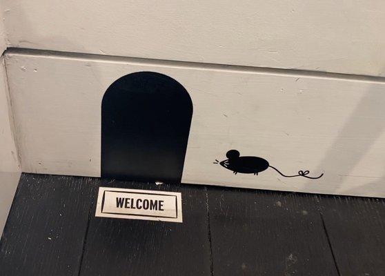 We just found out that this little mouse hole painting is in every store. I'm going to start looking for them. So cute!