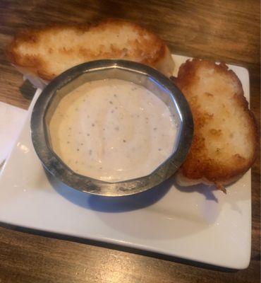 Garlic bread and peppercorn sauce