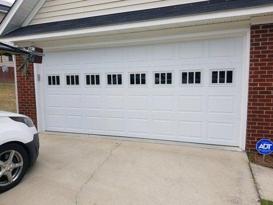 New garage door with Stockton windows.