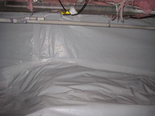 After. This is a typical 6 Mil Poly mesh reinforced vapor barrier install.