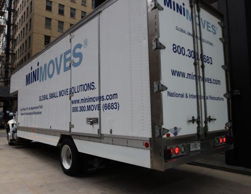 MiniMoves Truck navigating through the city of Chicago, IL