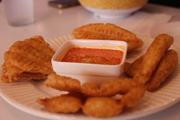 Roti with peanut sauce.