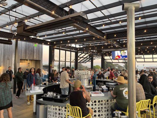 Shared space - Transmission Brewery Skybar and Toppers Pizza - the bar looking west toward the ocean