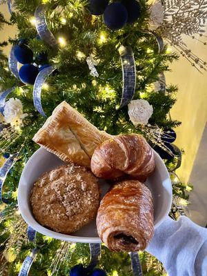 Some of the treat, chocolate croissants, spinach and feta croissants, butter croissants and mini pie