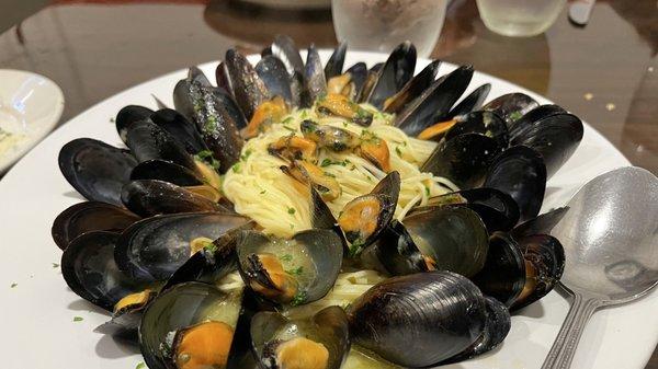 Muscles over a bed of angel hair pasta