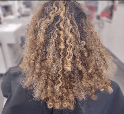 New client who was very nervous to fix her curls. This was the initial before.