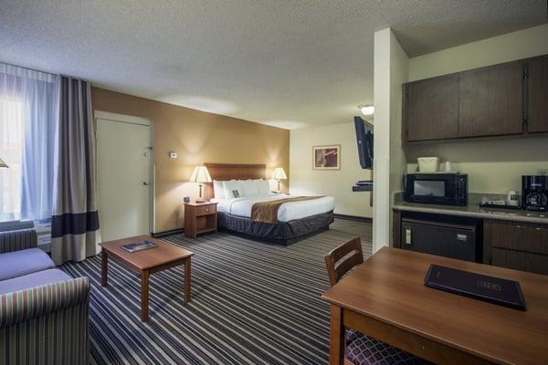 King suites with sofa sleeper can sleep up to 4 guests.  Dinette area hosts a microwave and refrigerator.