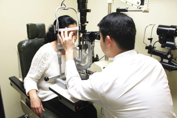 Dr.Lui giving a routine eye exam.