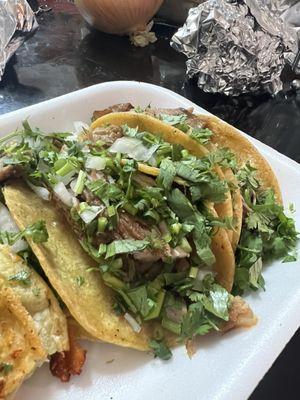 Carnitas with cilantro y cebollas