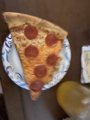 Very bad picture lol pep pizza and peach moonshine in the jar :)