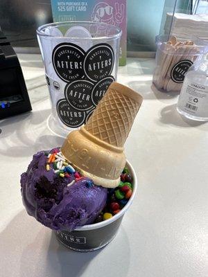 Two scoops of ice cream Ube Brownie and Strawberry Cookie Crunch