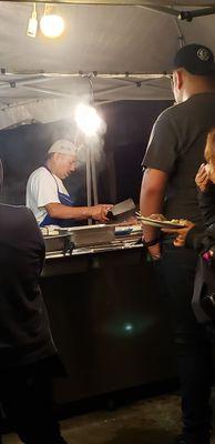 Tacos being prepared