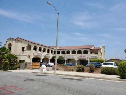 The building/ plaza from the street