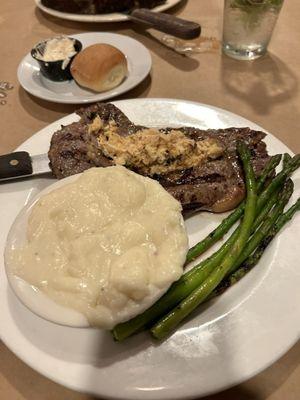 Ribeye with crab meat topping, asparagus, redskin mashed potatoes