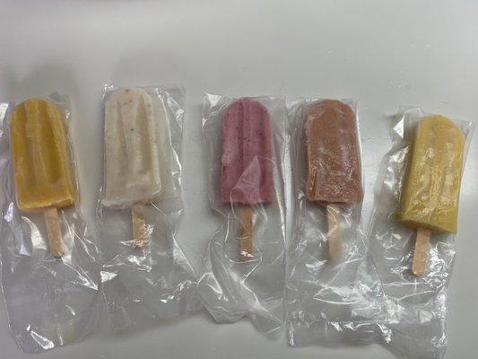 Mango, lychee, strawberry cream, guava cream, and lilikoi (passion fruit) paletas.