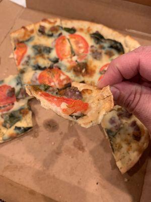 First time trying nicks pizza Margherita Thin Crust Pizza add sausage I'm so sorry but it was bad. Dry burnt no cheese. Not happy