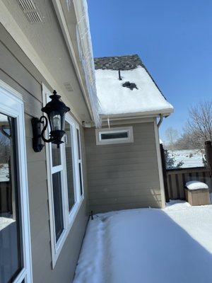 Icicles hanging on the back of my house.