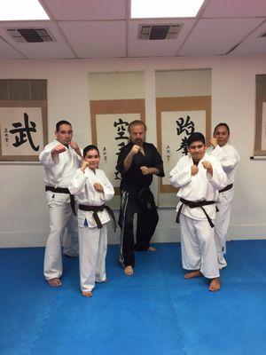 A family that stays together, fights together and gets their Black belts together. Black belt here we come:)