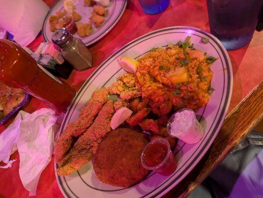 Fried catfish, crab cake, fried oyster, jambalaya