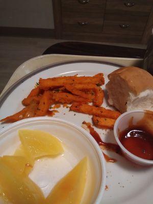 Here is some of the dinner.   It was cold sweet potato fries and some canned fruit.  I ate the meat portion only